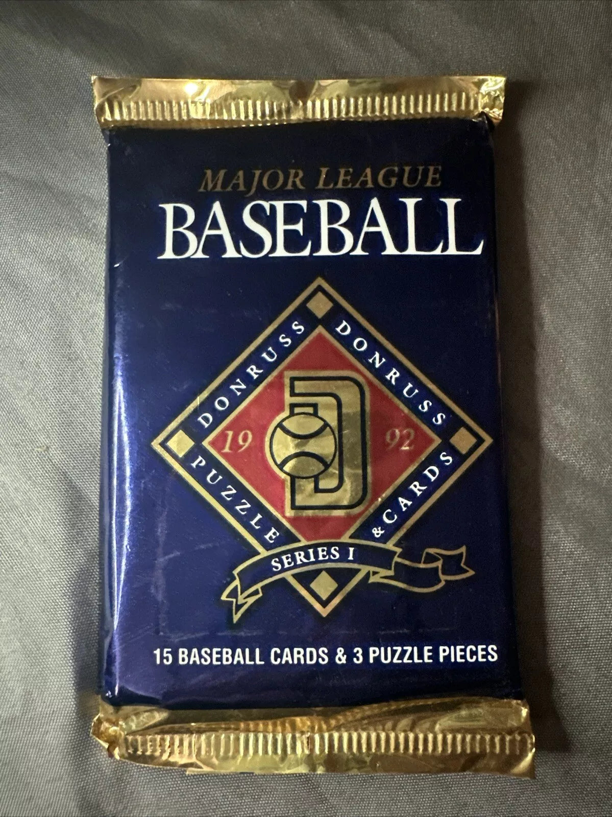 (1) One Pack - New Sealed 1992 DONRUSS Series 1 MLB Baseball Trading Card Pack - 15 Cards & 3 Puzzle Pieces